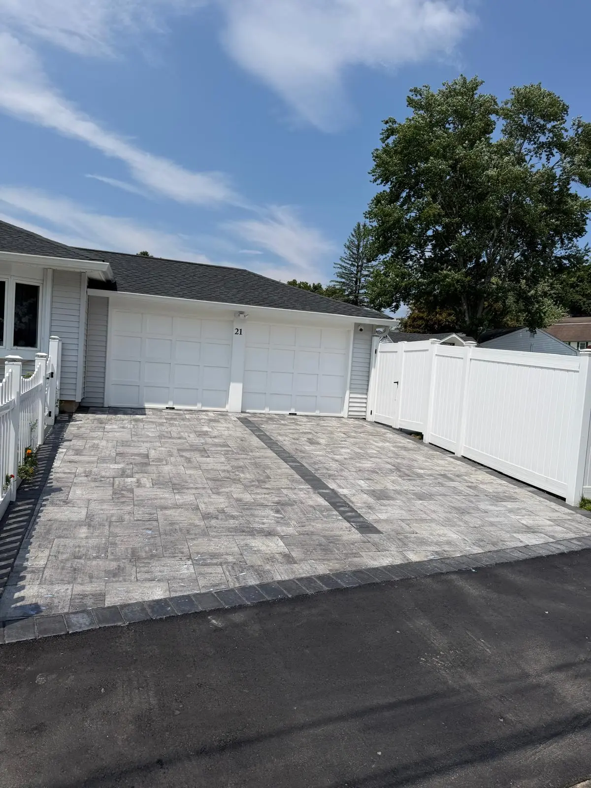 New residential driveway installation with masonry edging in Connecticut